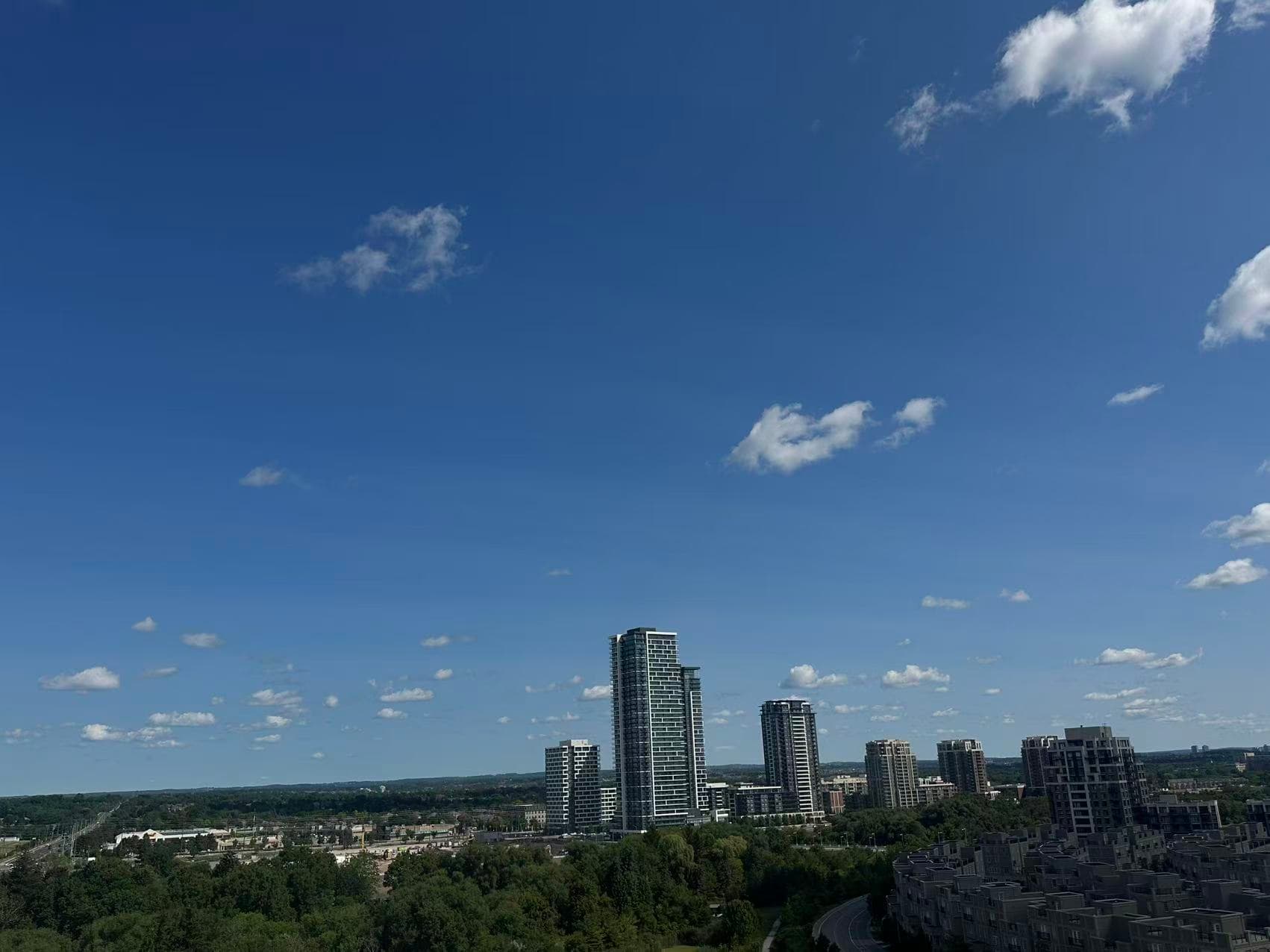 Daytime view across neighbourhoods and residential towers