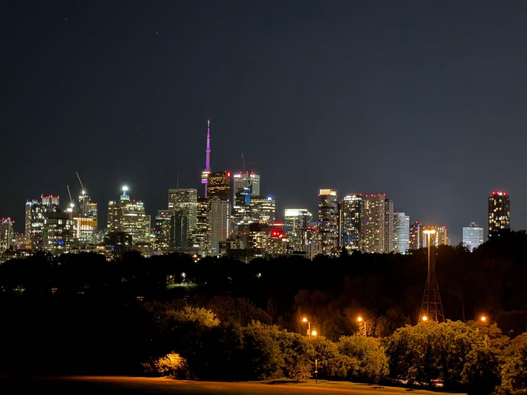 Toronto skyline at night, with the CN Tower above the city